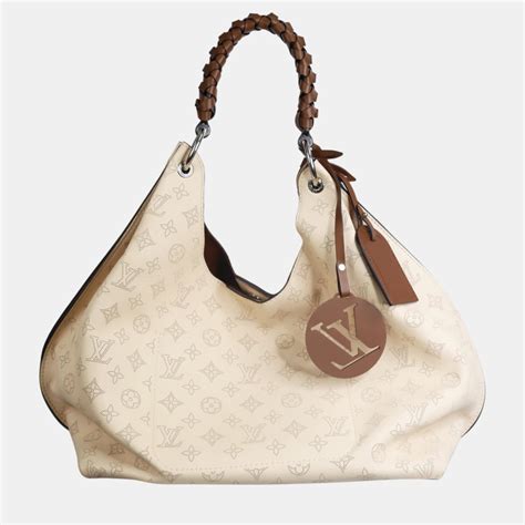 cream louis vuitton bag|louis vuitton mahina hobo bag.